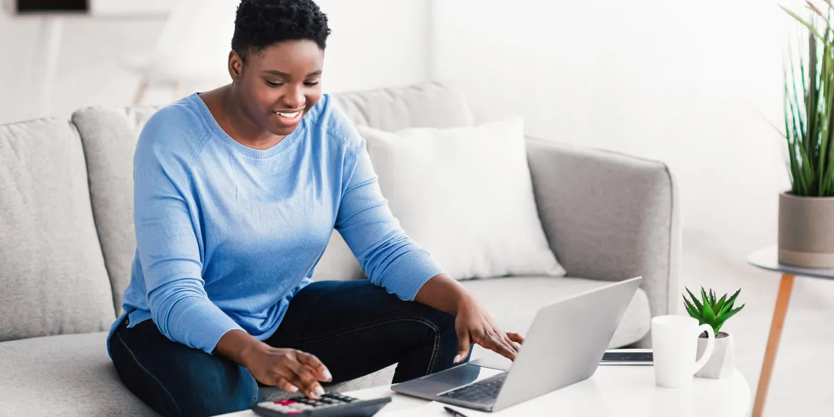 faithful-financial-Woman-and-laptop